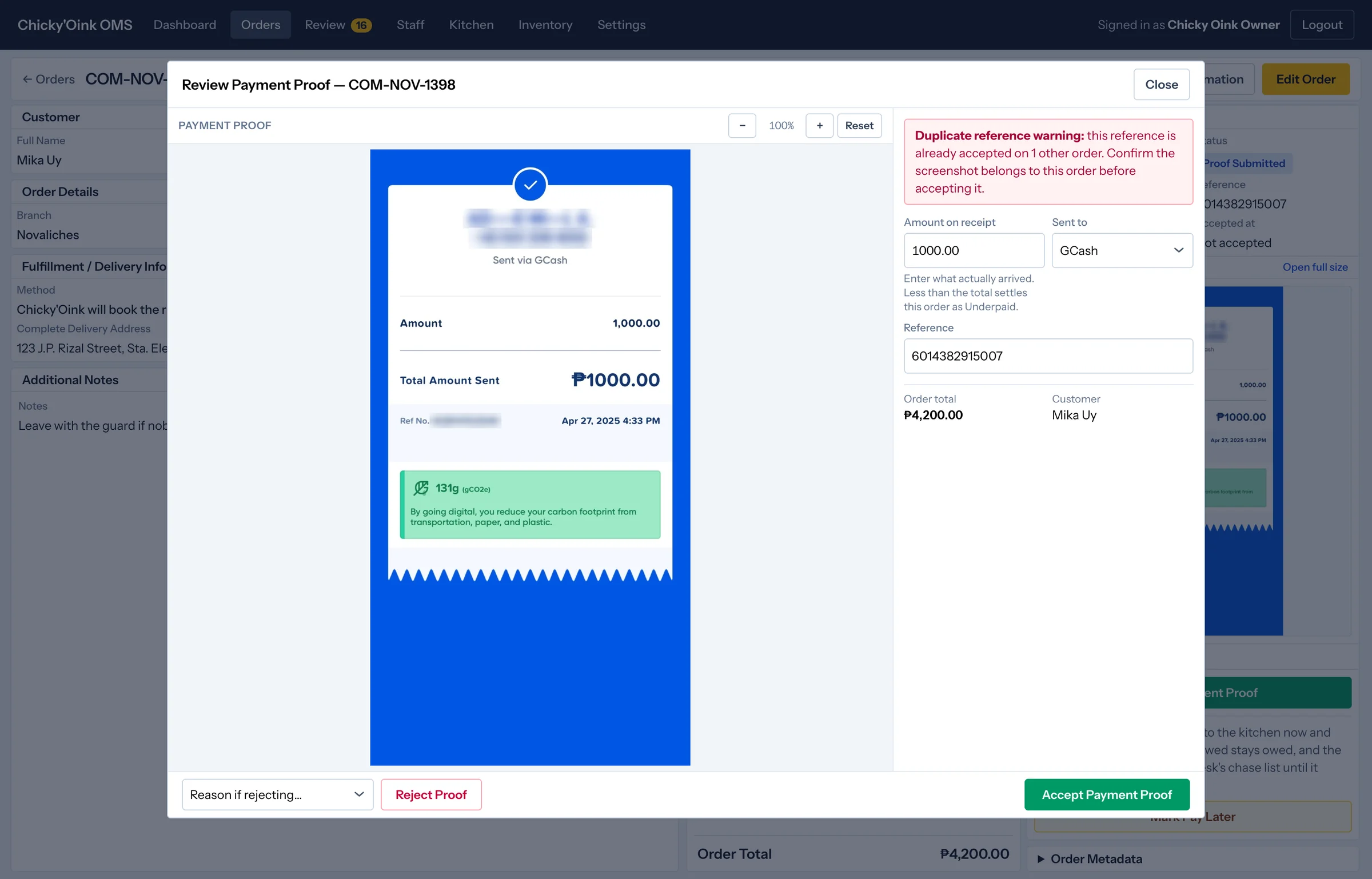 A payment proof under review with a red duplicate reference warning